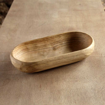 Fuente ovalada tallada en castaño